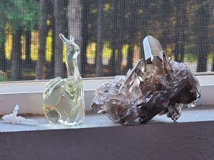 two crystals and a glass snail